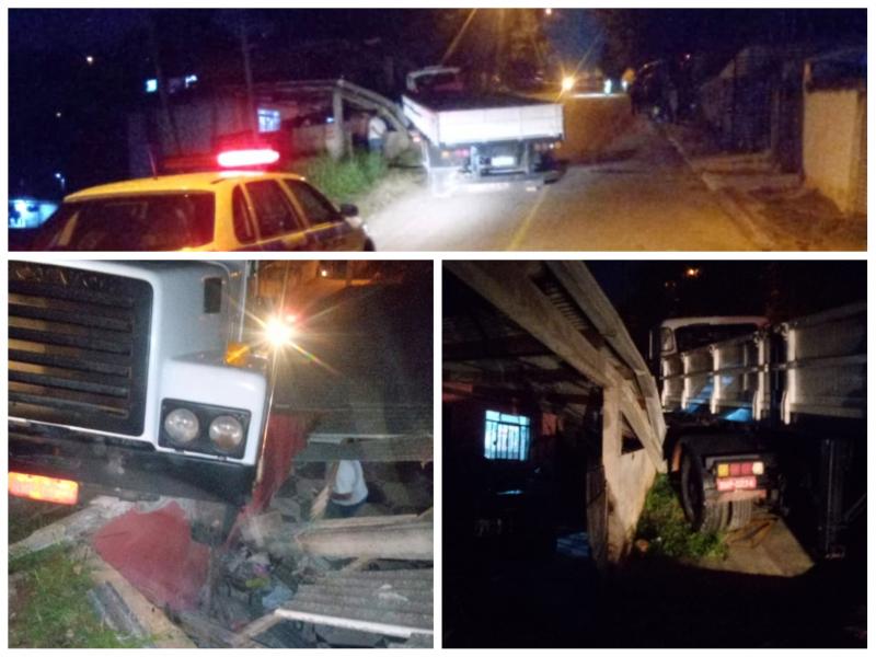 Carreta não vence subida e desce de ré atingindo uma casa na Vila Pompéia